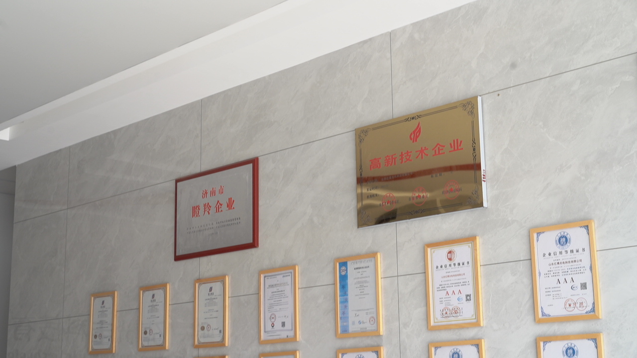 Ebocom certificates and qualification honors on wall